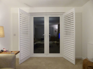 Open Plantation Shutters On French Patio Doors